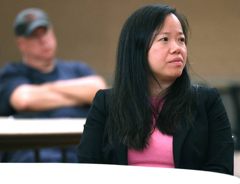 Linh Nguyen, of DeKalb, listens as State Rep. Amy “Murri” Briel, D-Ottawa, speaks Friday, July 11, 2025, during her town hall at at Northern Illinois University’s Holmes Student Center in DeKalb. Briel will be hosting town halls later this year in Oglesby and Utica.