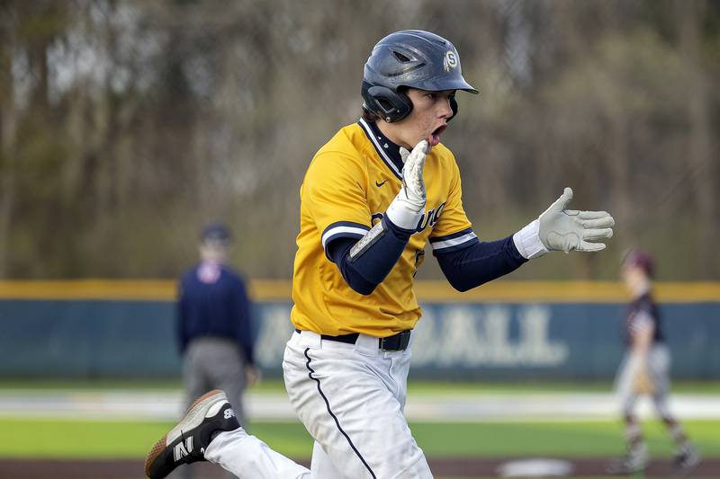 Sterling’s Adrian Monarrez celebrates crossing the plate for the tying run against Moline Wednesday, April 16, 2025.