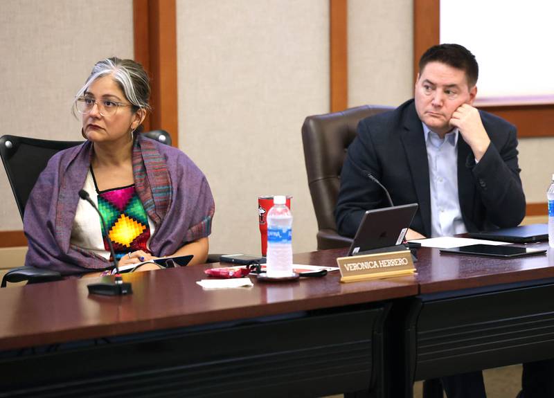 Northern Illinois University Board of Trustees members Veronica Herrero and John Butler listen to employees speak asking for higher wages at the NIU Board of Trustees meeting Thursday, Sept. 21, 2023, in Altgeld Hall on campus in Dekalb. Several NIU employees, represented by the American Federation of State, County and Municipal Employees, attended and spoke at the meeting seeking a fast resolution to a contract with higher pay.