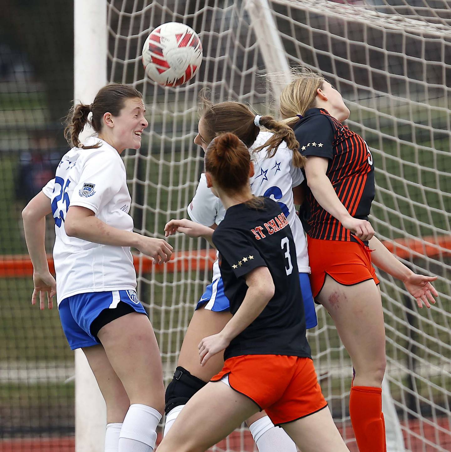 St. Charles North's Kaitlin Glenn (25) tries to head the ball into the net during the championship game of the Rose Augsburg Drach Invitational Saturday, March 29, 2025 in St. Charles Ill.