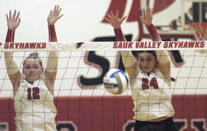 Skyhawk players Tori Balma and Maggie Richetta block a shot. Sauk Valley College beat South Suburban College in three sets Wednesday, November 6, 2024 at Sauk Valley Community College.