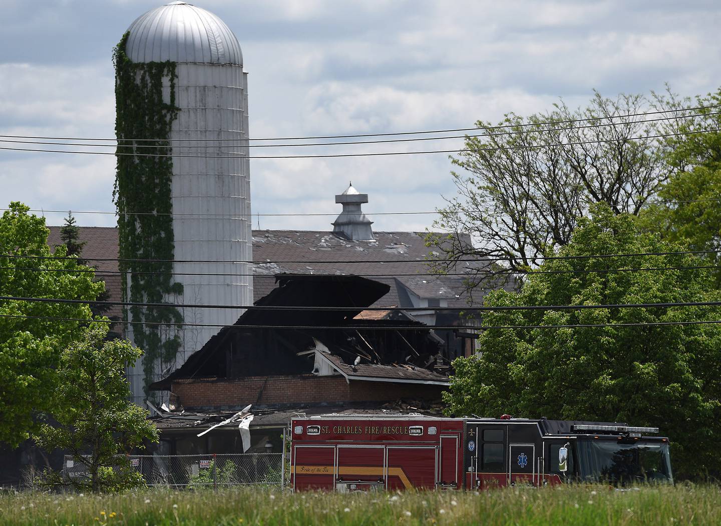 A Saturday fire was still smoking Sunday afternoon at the closed Pheasant Run Resort in St. Charles.