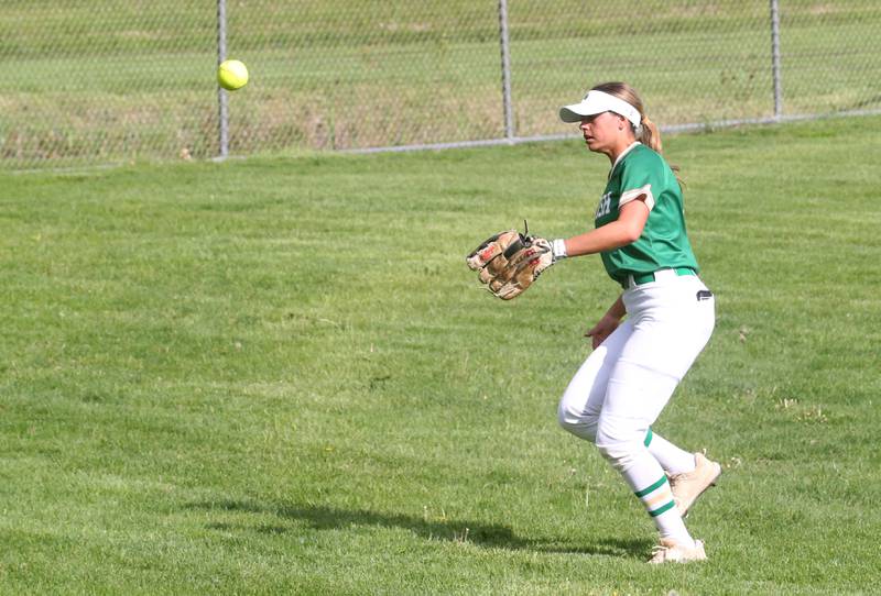 The ball sails over the head of Seneca's outfielder Audry McNabb on Friday, May 2, 2025 at Ottawa High School.