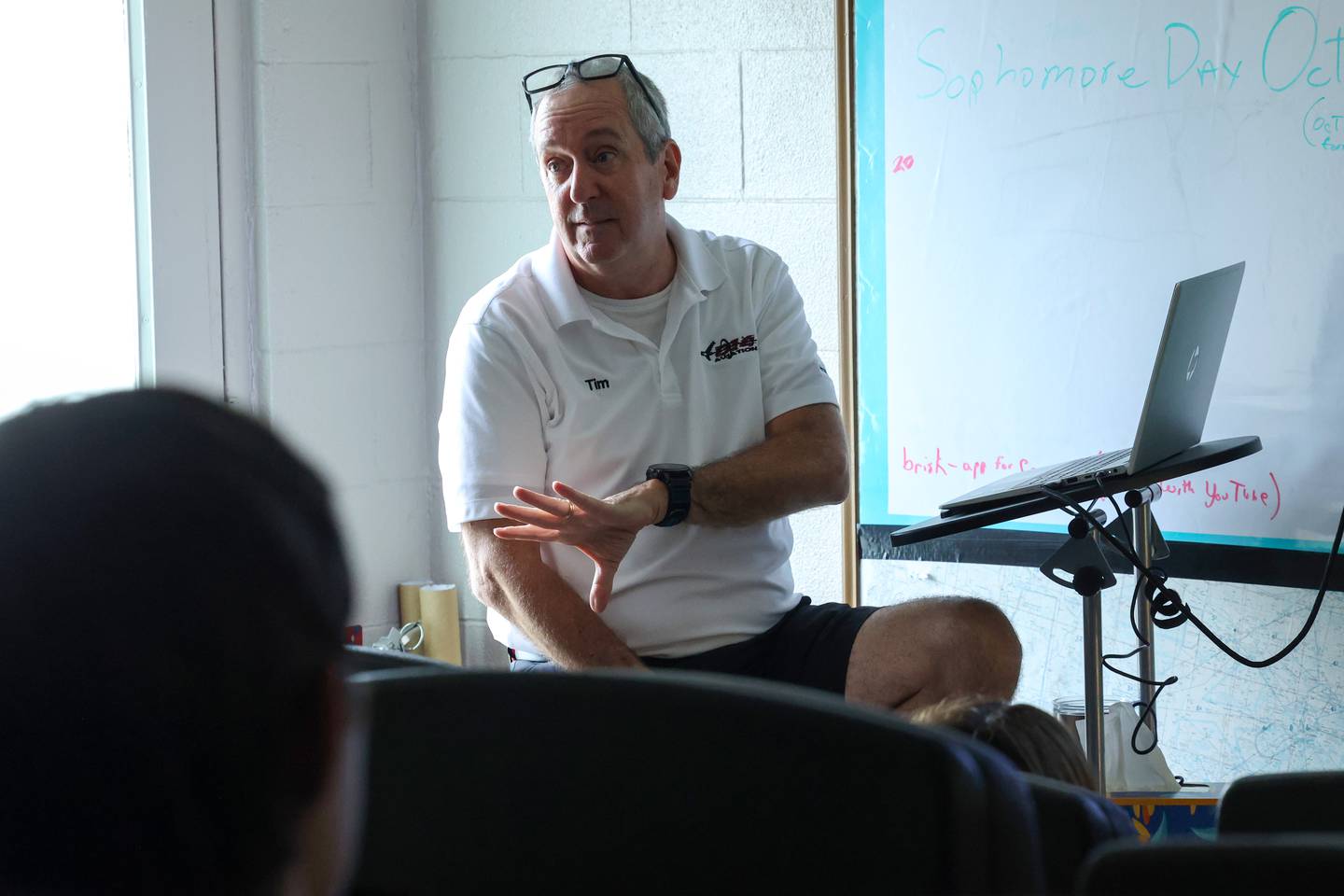 Instructor Tim Edwards teaches a lesson on planes used in World War II to area high school students as part of the Kankakee Area Career Center's new aviation program held at the Greater Kankakee Airport on Sept. 25, 2025.