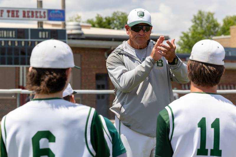 Head Coach Bill Booker of St. Bede encourages team after loss in regional championship game to Midland on Saturday, May 24, 2025 at Stark County High School in Toulon.