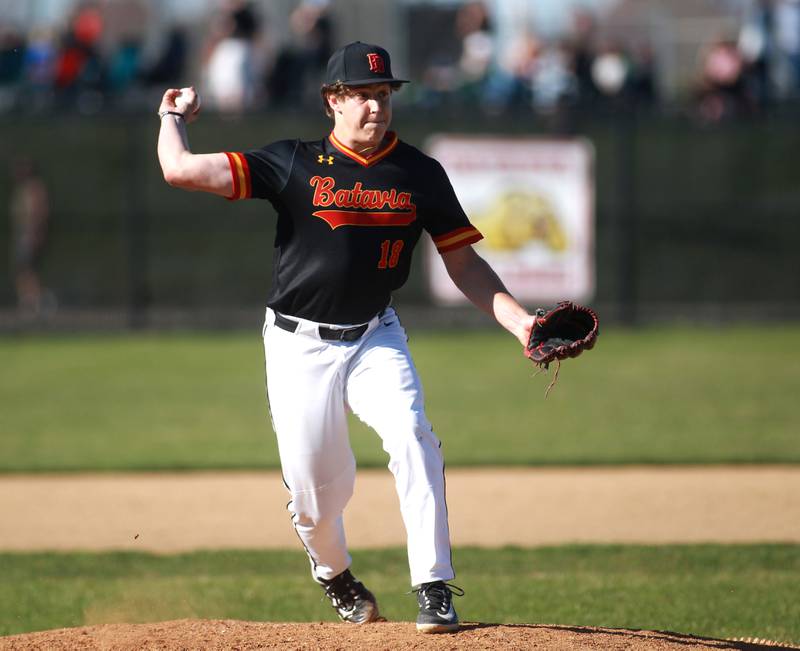 Batavia pitcher Gavin Rosengren attempts a pick off at first base during a game at St. Charles North on Monday, April 15, 2024.