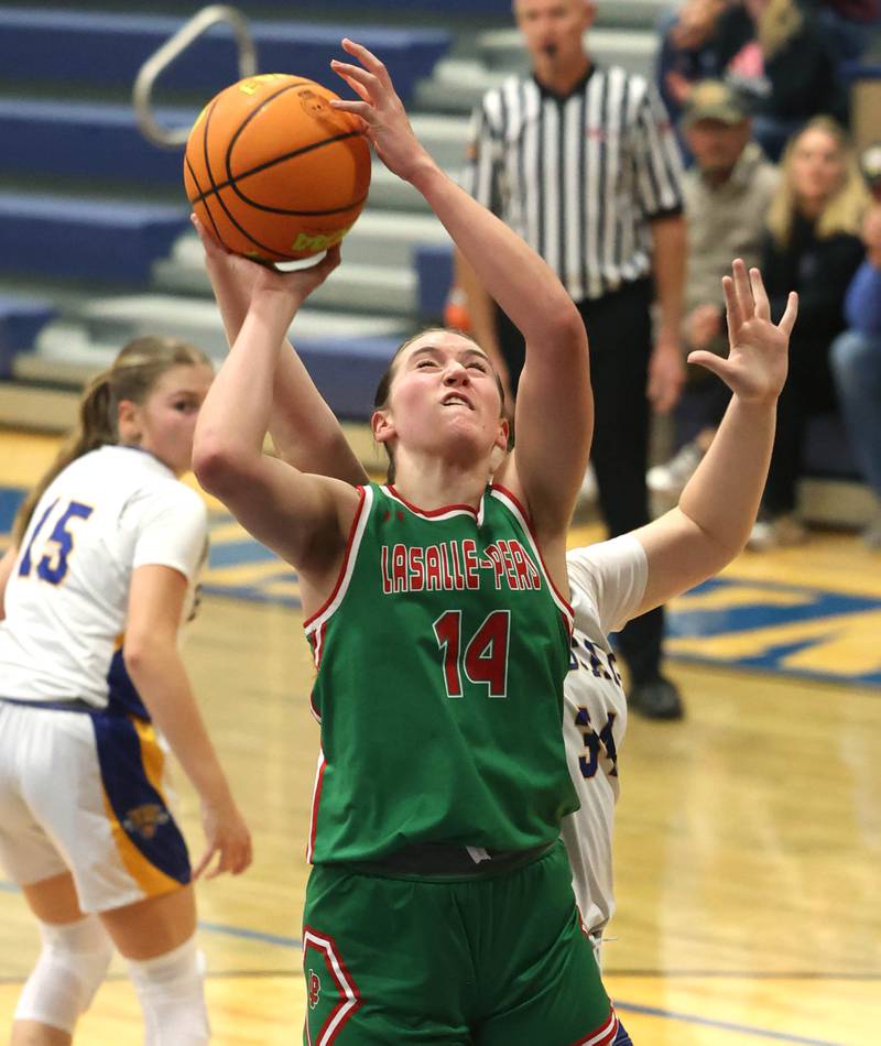 La Salle-Peru's Drew Depenbrock gets a shot up in front of Somonauk-Leland's MacKenna McMahan during their game Thursday, Nov. 20, 2025, in the Tim Humes Breakout girls basketball tournament at Somonauk High School.