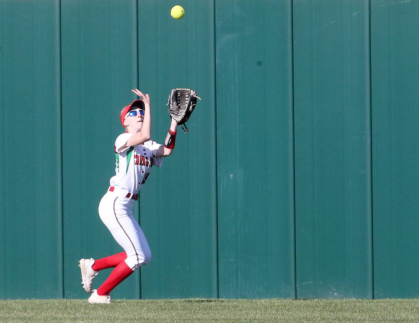 L-P's Lydia Steinbach catches a fly ball in left field against Kaneland on Wednesday, April 2024 at the L-P Athletic Complex in La Salle.