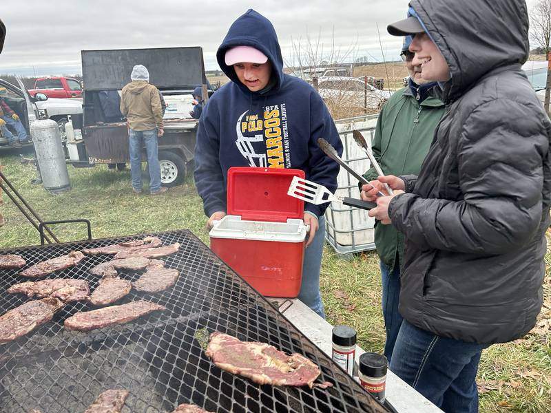 Polo High School students Maryn Clothier and Jillian Gorzny were busy helping Phil Fossler at the Ogle County Beef Producers food stand at the Spring Hazelhurst Consignment Sale on Saturday, April 4, 2026.
