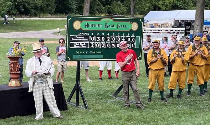 Ganymede's Captain Mark Herman (center) receives the sportsmanship award at the Work Tournament of Historic Base Ball on Sunday, Aug. 13, 2023.