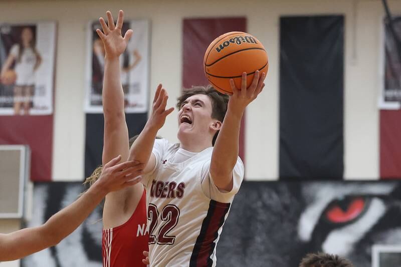 Plainfield North’s Samuel Finn battles for a shot against Naperville Central on Wednesday, Jan 22, 2025 in Plainfield.