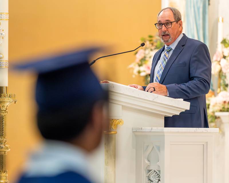 Marquette Academy Alumni accepts his Hall of Fame recognition at the 2026 Marquette Academy Graduation Ceremony on May 24, 2026 at St. Columba Church in Ottawa.