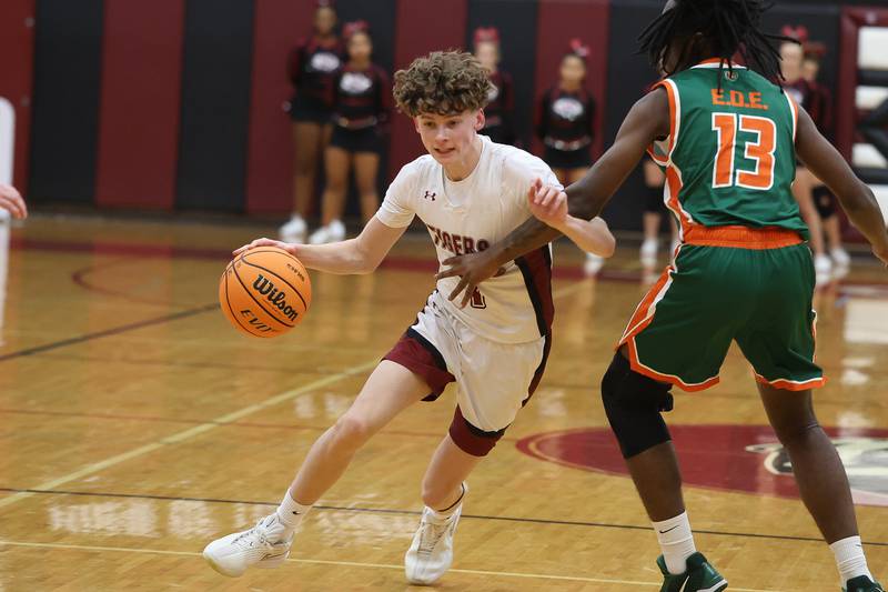 Plainfield North’s Tommy Potts drives to the paint against Plainfield East on Tuesday, Dec. 9, 2025 in Plainfield.