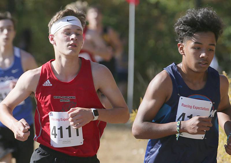 Henry-Senachwine's Preston Rowe and Bureau Valley's Adrian Gallardo run in the Class 1A Regional Cross Country boys race on Saturday, Oct. 22, 2022 at the Seneca FFA Farm in Marseilles.