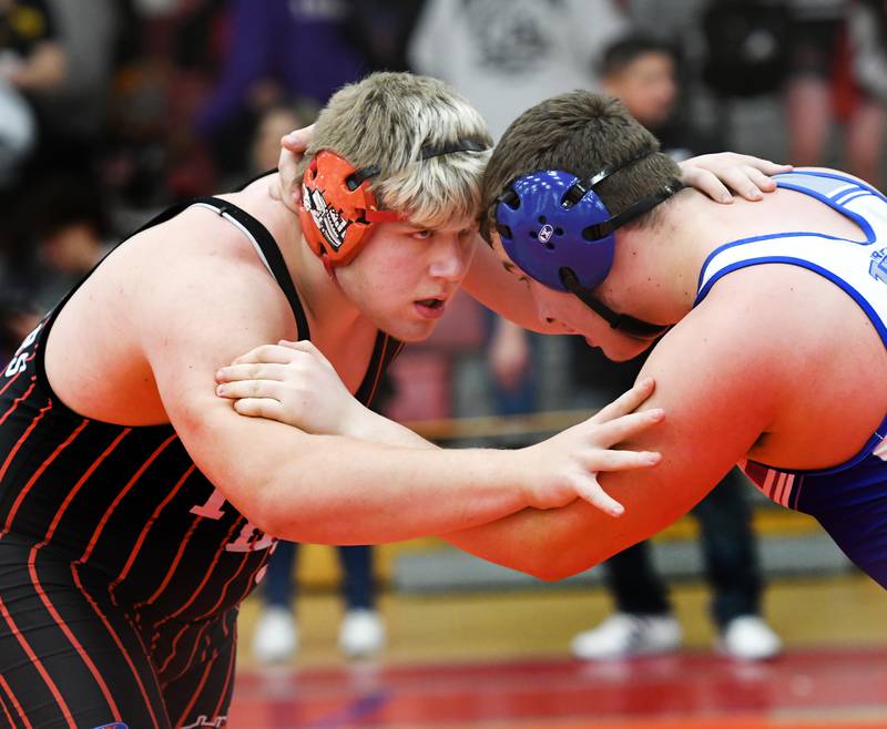 Fulton's Braiden Damhoff stares at Princeton's Cade Odell during the start of their 285-pound match at the 1A Oregon Wrestling Sectional on Friday night.