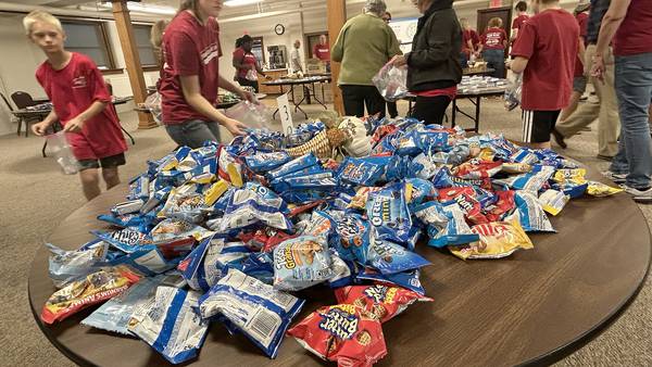 Photos: Mt. Morris church creates care packages for U.S. Navy sailors
