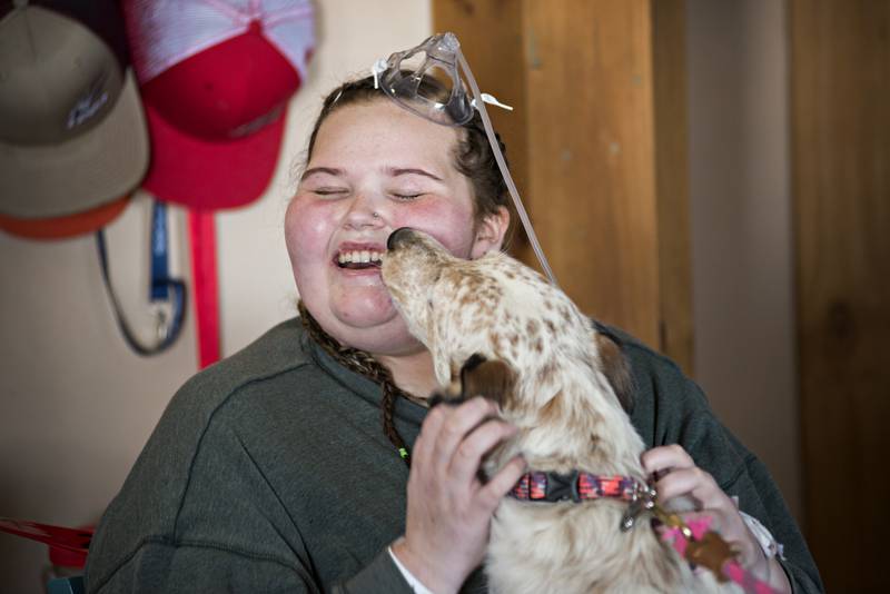 Carlie received quite a warm welcome home from not only husband mom but two cats, Nova and Cam and her very excited pooch Bella.