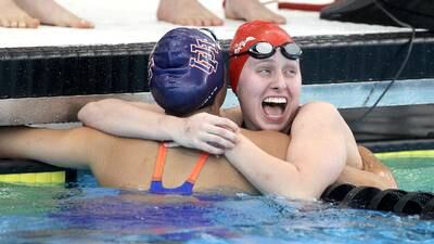 Girls Swimming: Kit Schneider races to 50 free title, leads Hinsdale Central to tie for second place