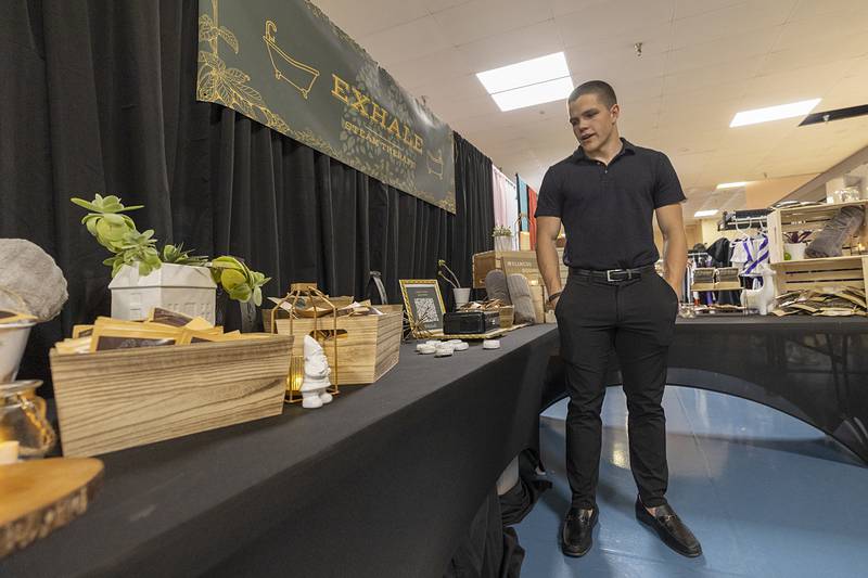Owen Belzer, a Dixon senior, pitches his steam therapy product, Exhale, on Wednesday, April 29, 2026. Made with essential oils, the product sits in the corner of the shower and releases relaxing scents.