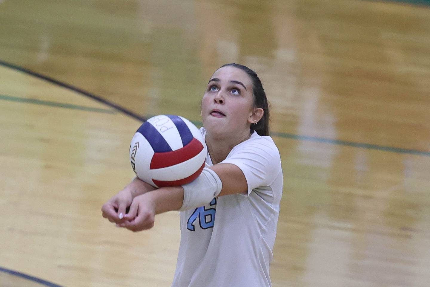 Joliet Catholic's Ella Godeaux keeps the volley alive against Providence on Thursday, Sept. 19, 2024 in New Lenox.