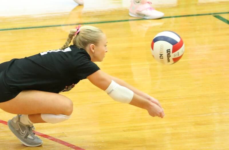 Ottawa's Ella Damron digs the ball while playing L-P during Volley for a Cure night on Tuesday, Oct. 1, 2024 at AJ Sellett Gymnasium.