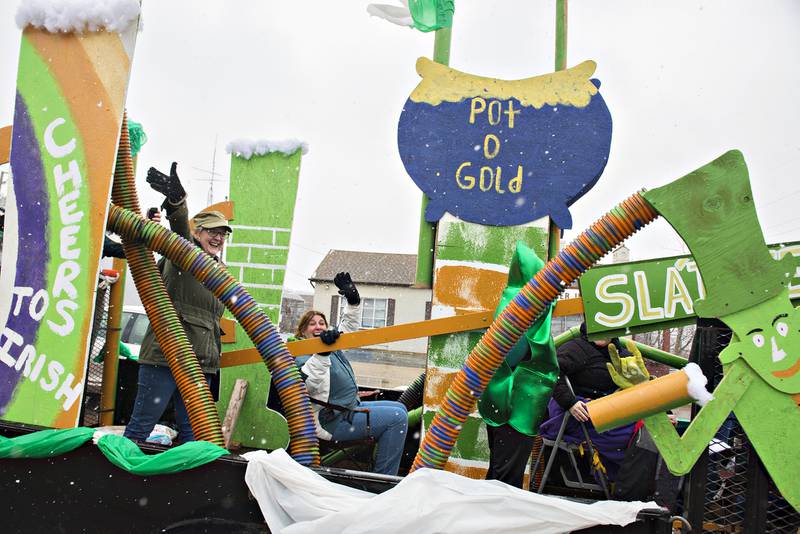2020 File: Dee Lahey (middle) waves from a float during a short and sweet St. Patrick’s parade in Dixon. COVID restrictions nixed the festivities.