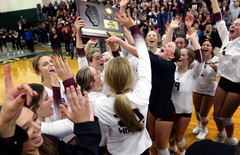 Prairie Ridge celebrates their come from behind 2-1 game victory over St. Francis in the IHSA Class 3A Grayslake Central Supersectional volleyball match on Monday, Nov. 11, 2024, at Grayslake Central High School.