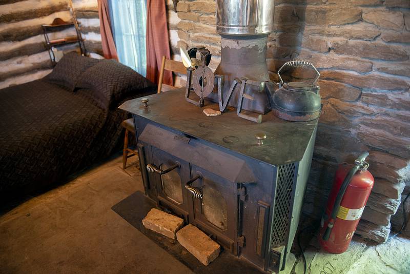 On cooler nights, the wood-burning stove in Tim Benedict's cabin will keep things toasty and warm.