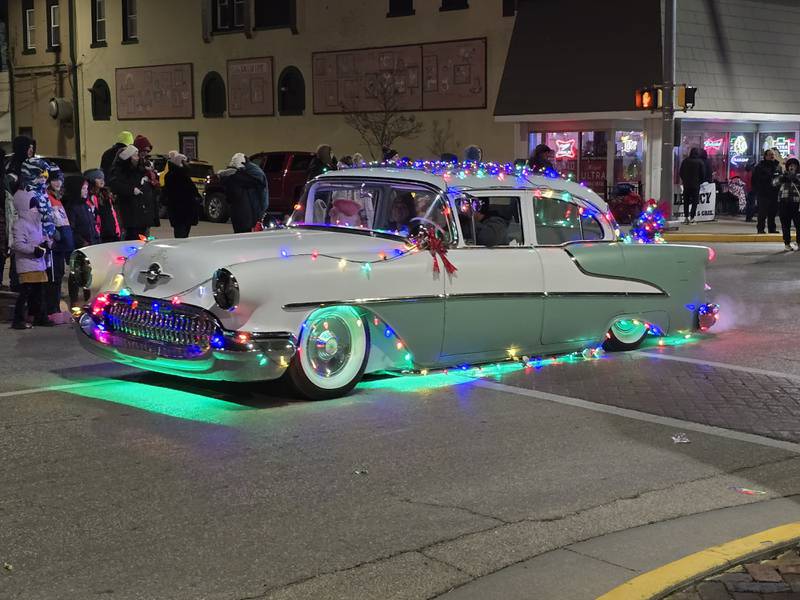 A classic car is decorated for the holidays Saturday, Nov. 30, 2024, during the Lighted Christmas Parade in Streator.
