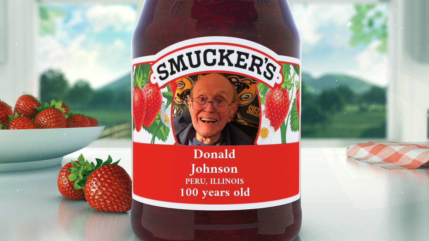 WWII Veteran and Peru resident Don Johnson celebrates his 100th birthday by getting his face printed on a Smuckers' jar.
