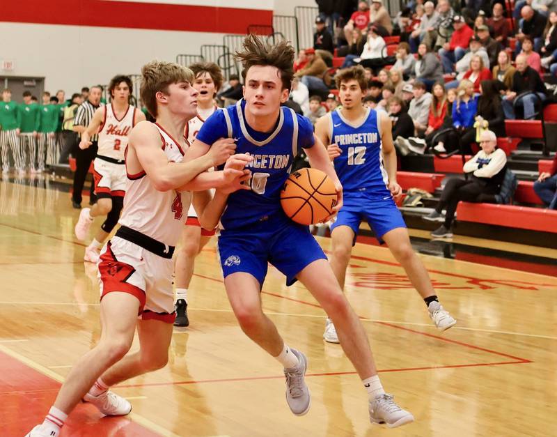 Hall's Luke Bryant defends Princeton's Gavin Lanham at the Colmone Classic on Friday night.