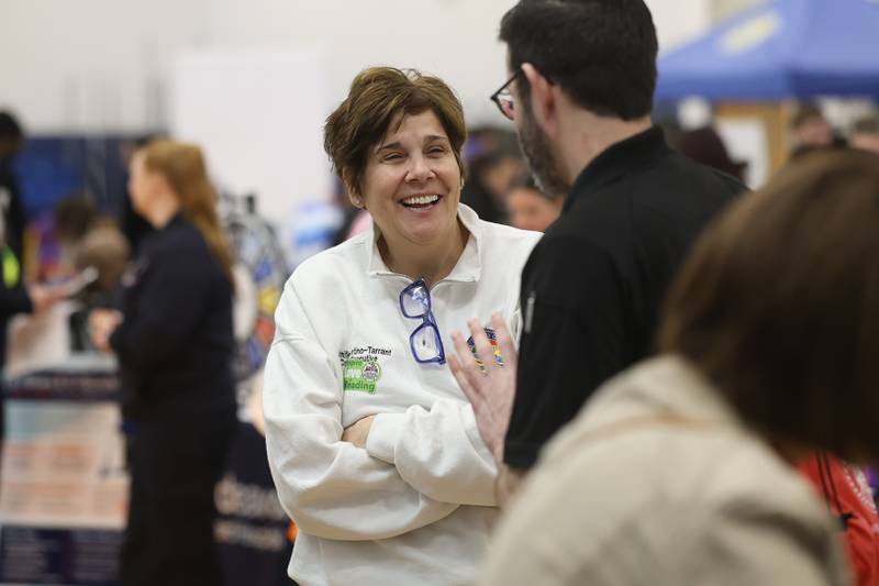 Will County Executive Director Jennifer Bertino-Tarrant talks with a guest during the Will County’s annual Kids Fair at Troy Middle School on Monday, Feb. 16, 2026 in Joliet.