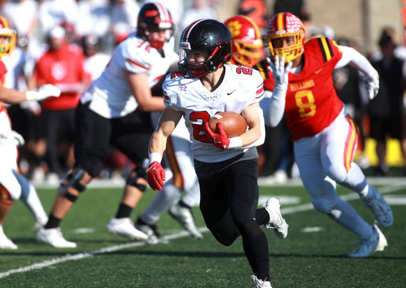 Lincoln-Way Central’s Anthony Noto carries the ball during the Class 7A second round playoff game against Batavia in Batavia on Saturday, Nov. 4, 2023.