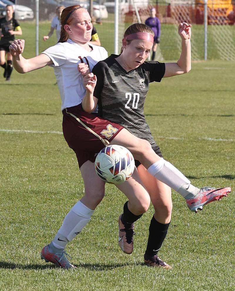 Morris' Makensi Martin (left) and Sycamore's Cortni Kruizenga get tangled up going after a loose ball during their Interstate 8 Conference Tournament semifinal game Wednesday, May 3, 2023, at Sycamore High School.