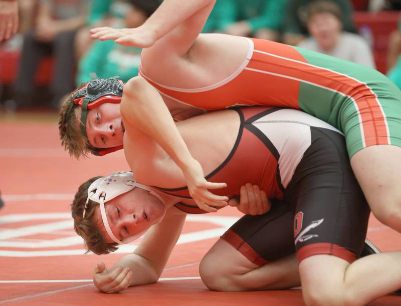L-P's Beau Lawrence, wrestles Ottawa's Wyatt Mix, during a meet on Thursday Jan. 8, 2026 in Kingman Gymnasium at Ottawa High School.