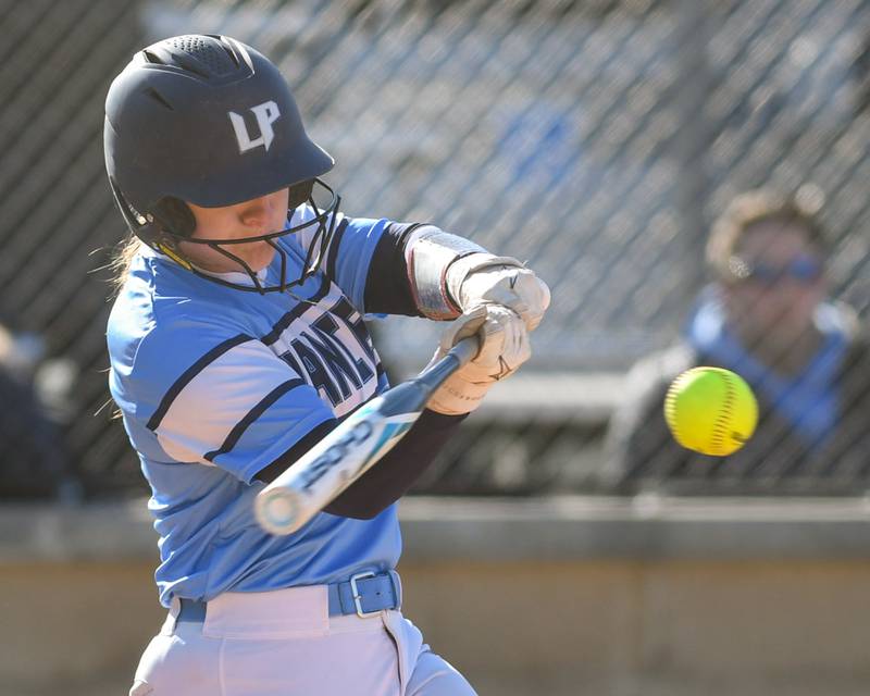 Lake Park's Gaetana Calo (17) makes contact with the ball and gets a single during the game on Wednesday April 24, 2024, while taking on St. Charles North at Lake Park High School.