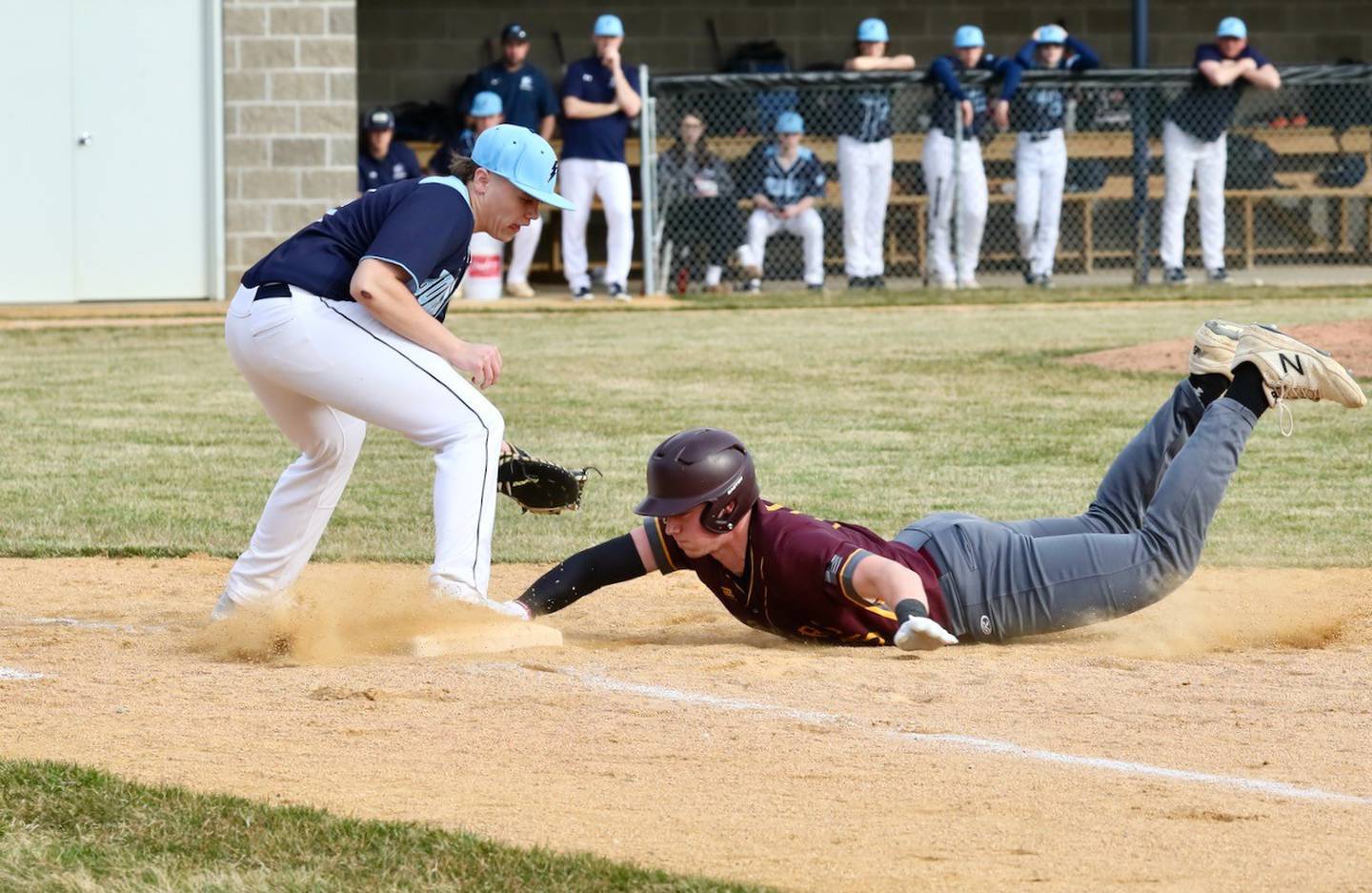 Bureau Valley first baseman Brik Rediger takes the late throw on a pickoff attempt Tuesday' against ROWVA..
