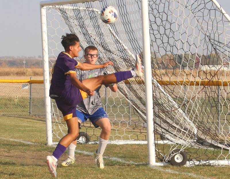 Mendota's Sebastian Carlos arrives late to the ball as Princeton keeper Landon Davis eyes the ball during the Class 1A Regional final game on Tuesday, Oct. 22, 2024 at Serena High School.