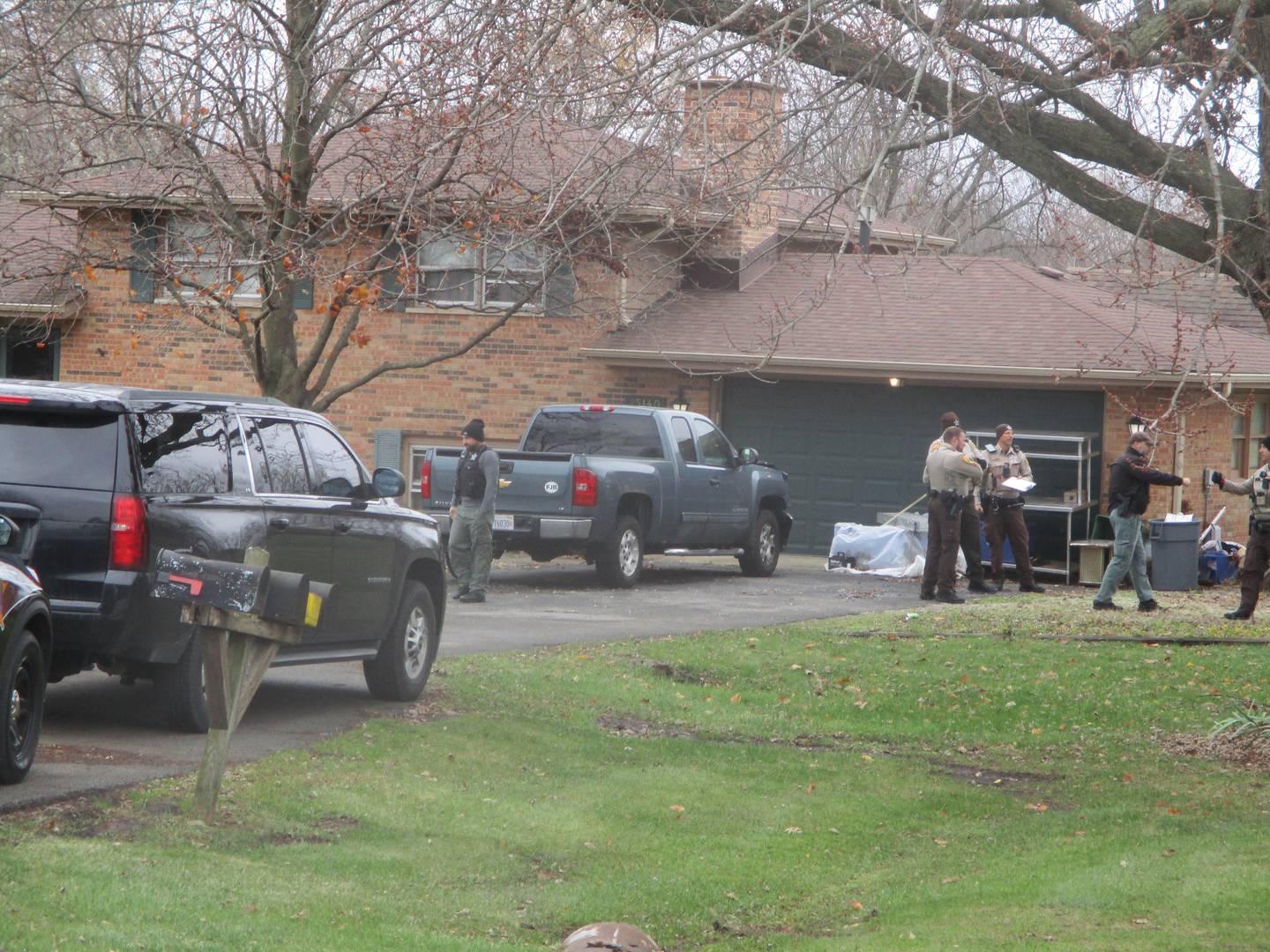 Will County Sheriff's Police outside the house in Dina Court where a man was taken into custody after barricading himself inside on Friday morning. Nov. 22, 2024