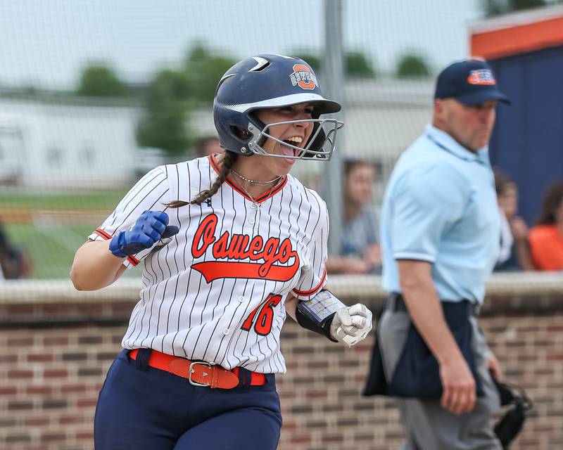 Oswego's Rikka Ludvigson (16) reacts after scoring a run during Class 4A Oswego Regional final softball game between Yorkville at Oswego. May 24th, 2024.