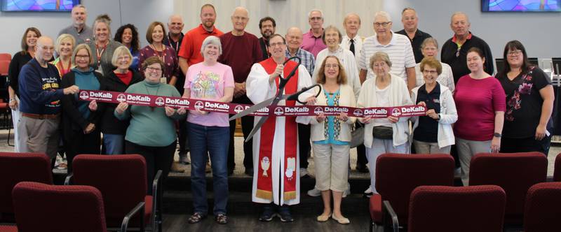 The DeKalb Chamber of Commerce welcoming First United Methodist Church's new location with a ribbon-cutting