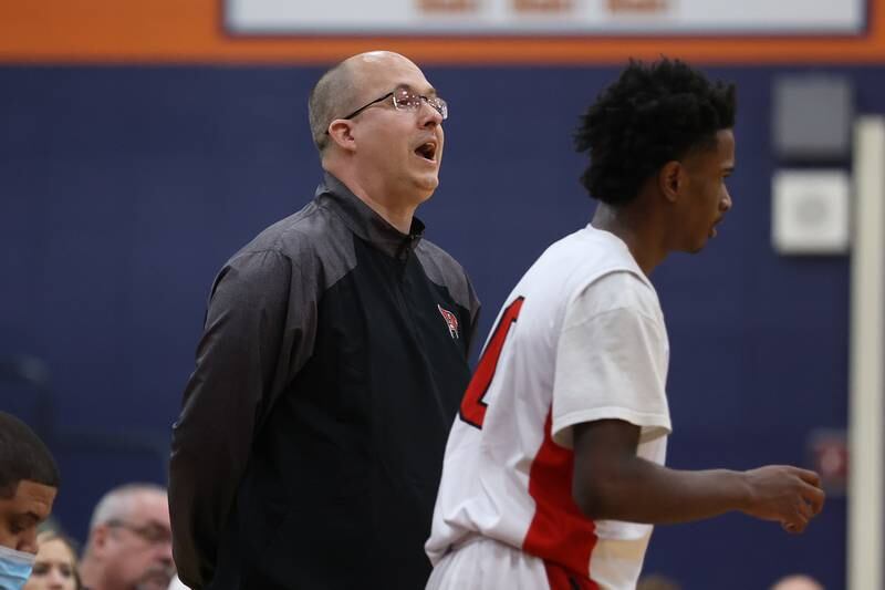 Bolingbrook head coach Rob Brost calls out a play against Andrew in the Class 4A Oswego Sectional semifinal. Wednesday, Mar. 2, 2022, in Oswego.