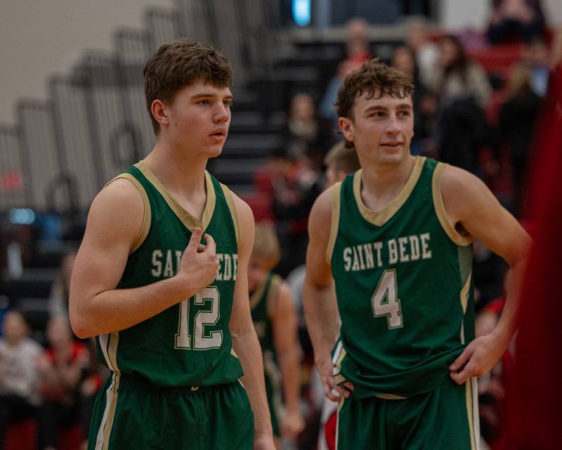 St. Bede's Carson Riva (12) questions official's technical foul call in game against Hall on Saturday, January 31, 2026 at Hall High School in Spring Valley.