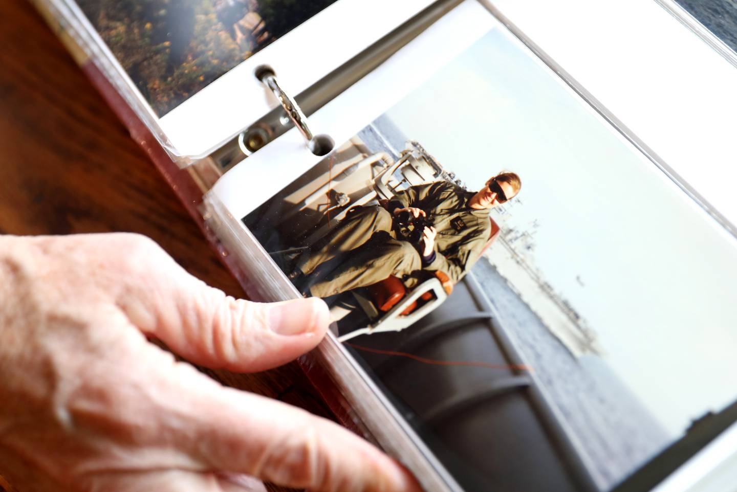 Downers Grove resident Annie Wick, who retired from the Navy in 2016 at the rank of Commander after 12 years of active duty and 12 years in the Navy reserves, shows a photo from one of her deployments. Wick was a Special Operations Officer and worked as a diving and salvage officer, earning her surface warfare qualification. She also attended explosive ordnance disposal school and was designated an EOD Officer (bomb disposal).