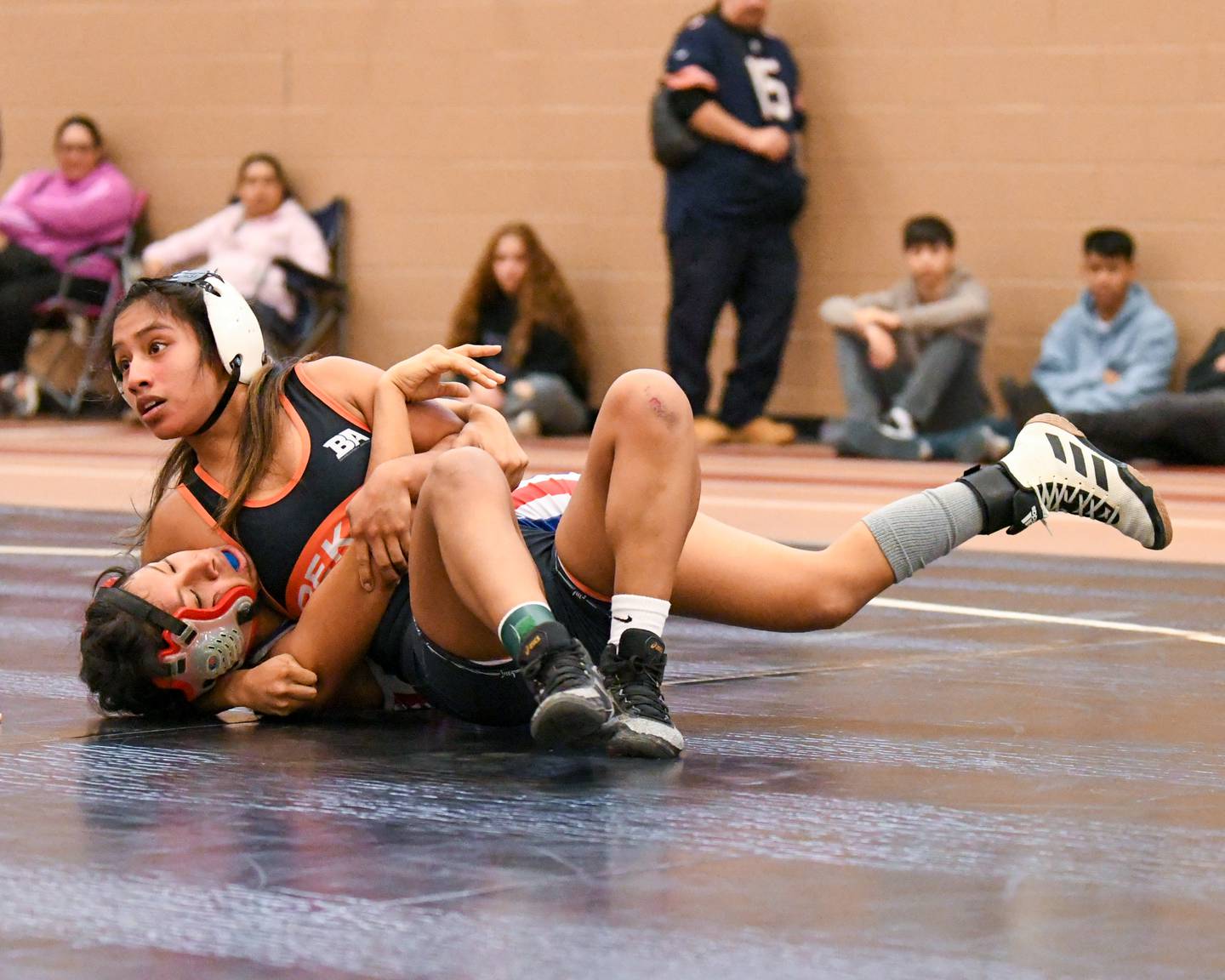 DeKalb’s Alex Gregorlio Perez pins Dundee Crown Iris Torres in the 110 weight class during a quad meet on Saturday Nov. 22, 2023, held at DeKalb high School.