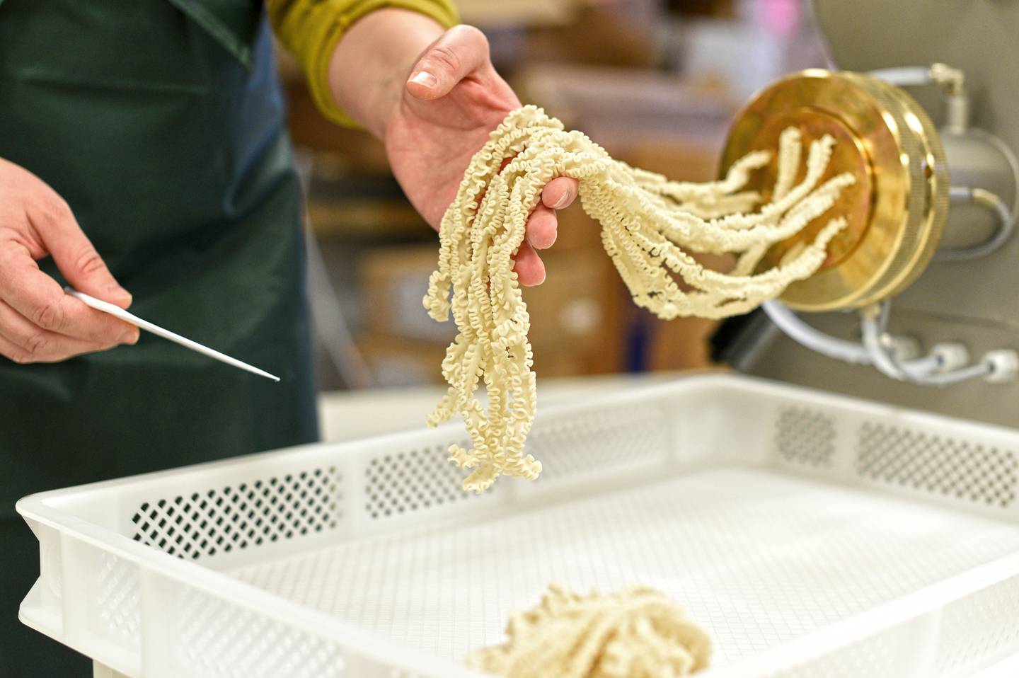 Lauren McLaughlin makes a batch of malfalde pasta at Ugly Noodle in Geneva.