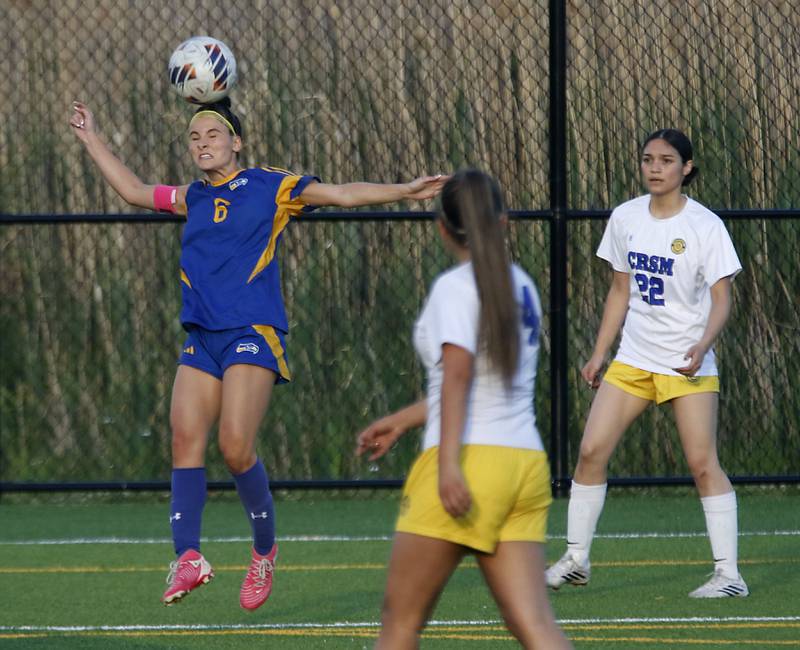 Johnsburg's Liz Smith heads the ball during an IHSA Class 1A Cristo Rey St. Martin Sectional semifinal girls soccer match against Cristo Rey St. Martin on Tuesday, May 26, 2026 at Cristo Rey St. Martin College Prep, in Waukegan.