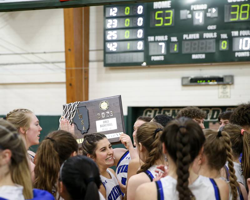 Geneva celebrates winnng the Class 4A Glenbard West Sectional final game against Batavia.  Feb 23, 2023.