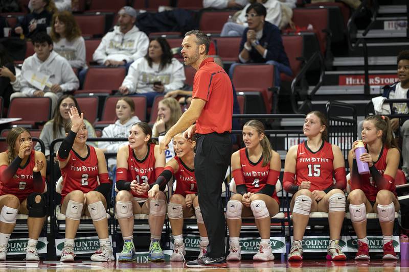 Timothy Christian Head Coach Scott Piersma works for the sidelines against El Paso-Gridley Saturday, Nov. 16, 2024, in the Class 2A third place state volleyball match at CEFCU Arena in Normal.