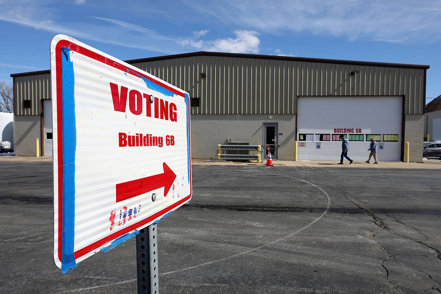 Voters walk into the Algonquin Township polling location on Tuesday, March, 17, 2026, to cast their ballots in the Illinois primary election.